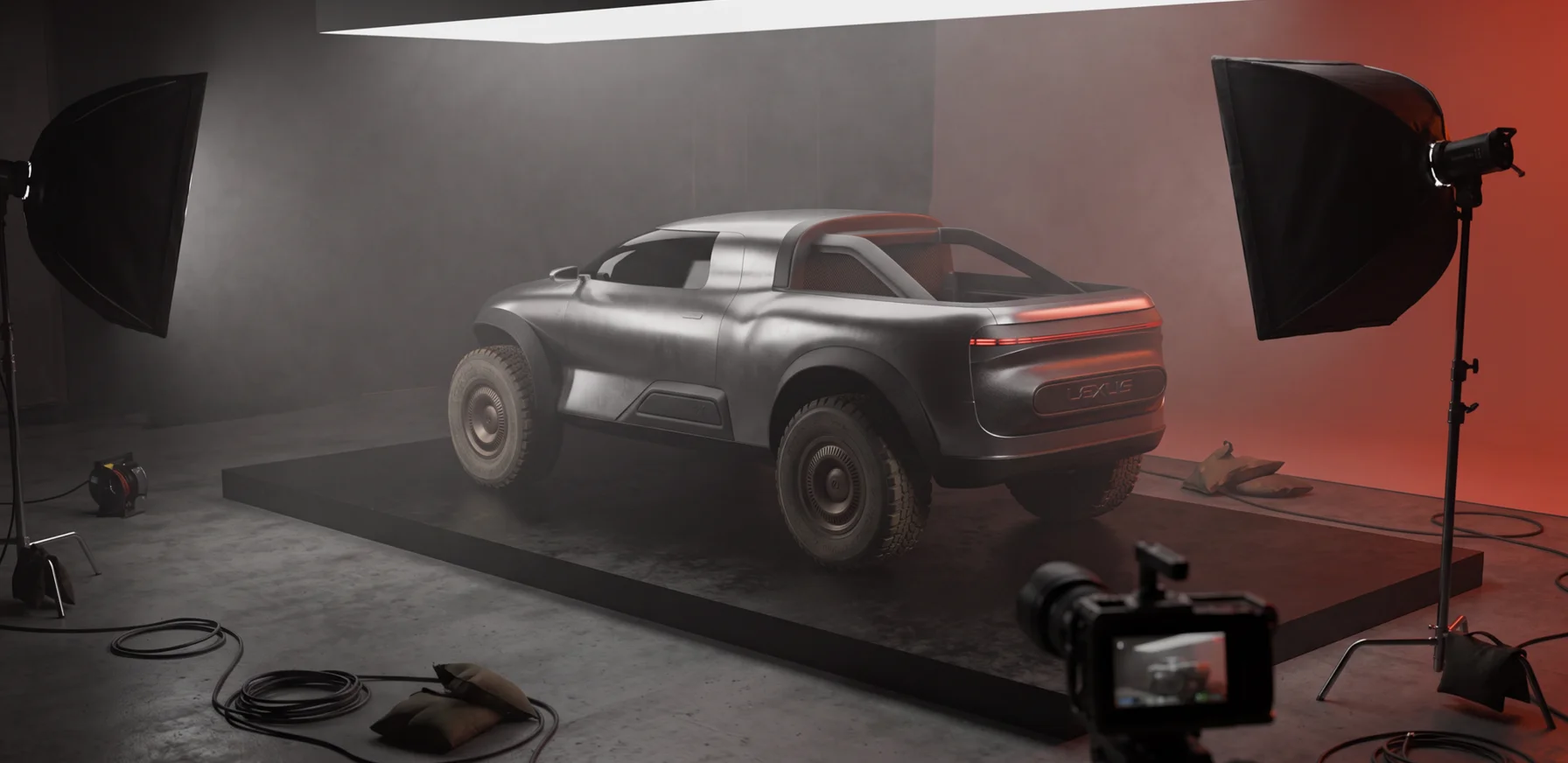 Rear three-quarter view of the Lexus EX off-road concept vehicle on a studio set during a behind-the-scenes photoshoot.