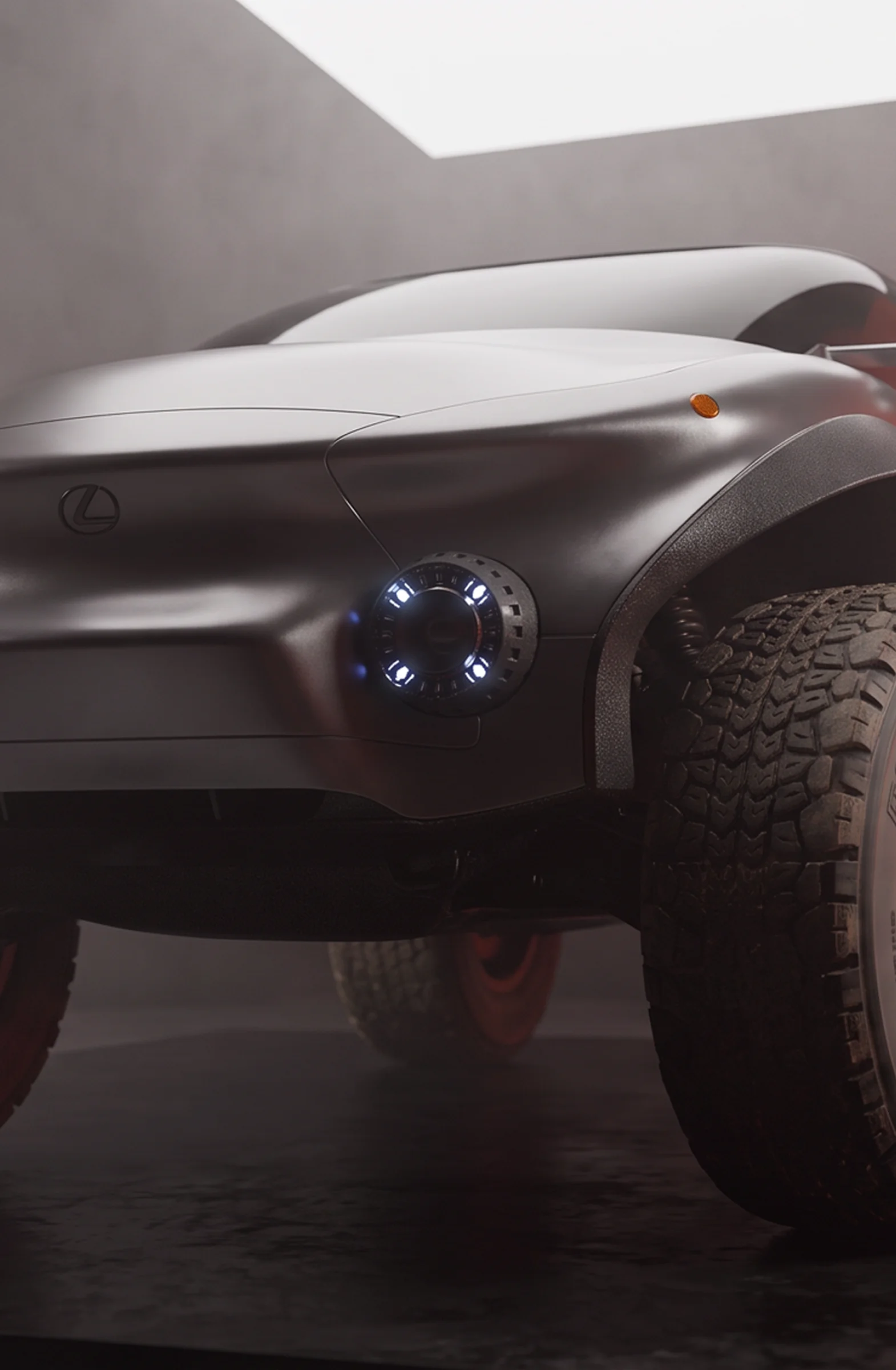 Low-angle front three-quarter view of the Lexus EX off-road concept vehicle on a studio set during a behind-the-scenes photoshoot.