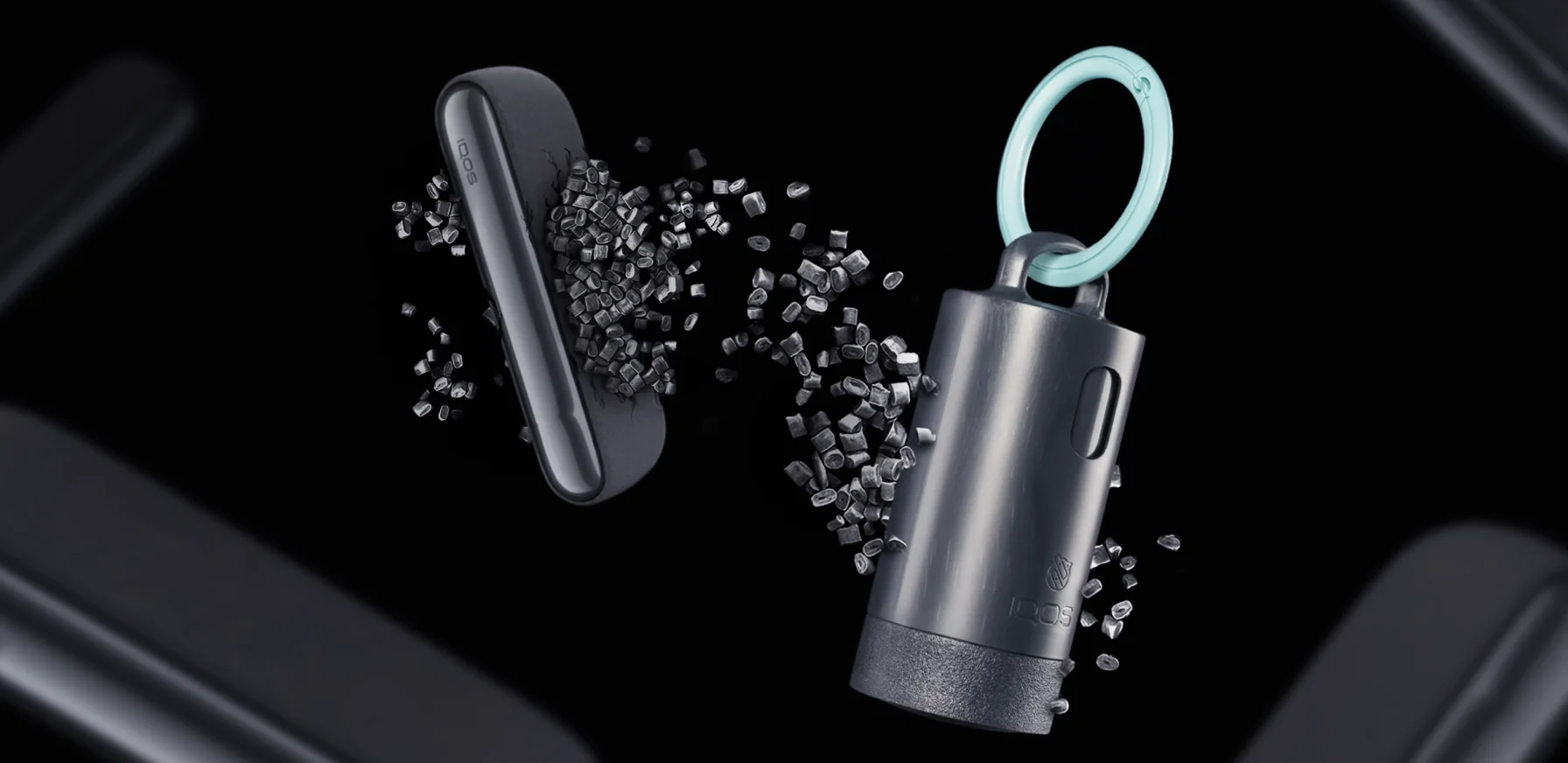 IQOS Clip Case with a turquoise carabiner shown among recycled plastic pellets and IQOS devices on a dark background.