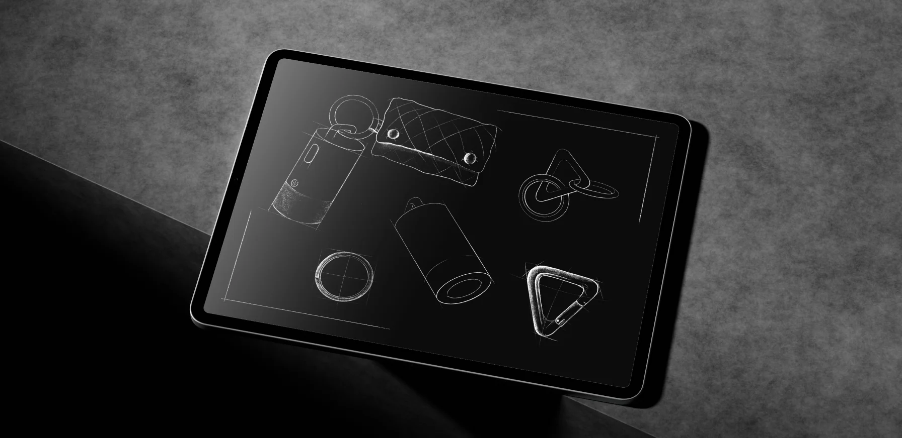 Product design sketches of the IQOS Clip Case, carabiner and ring displayed on a tablet.