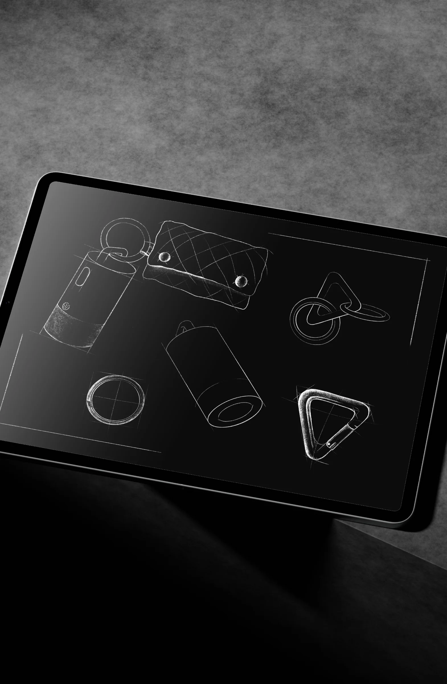 Product design sketches of the IQOS Clip Case, carabiner and ring displayed on a tablet.